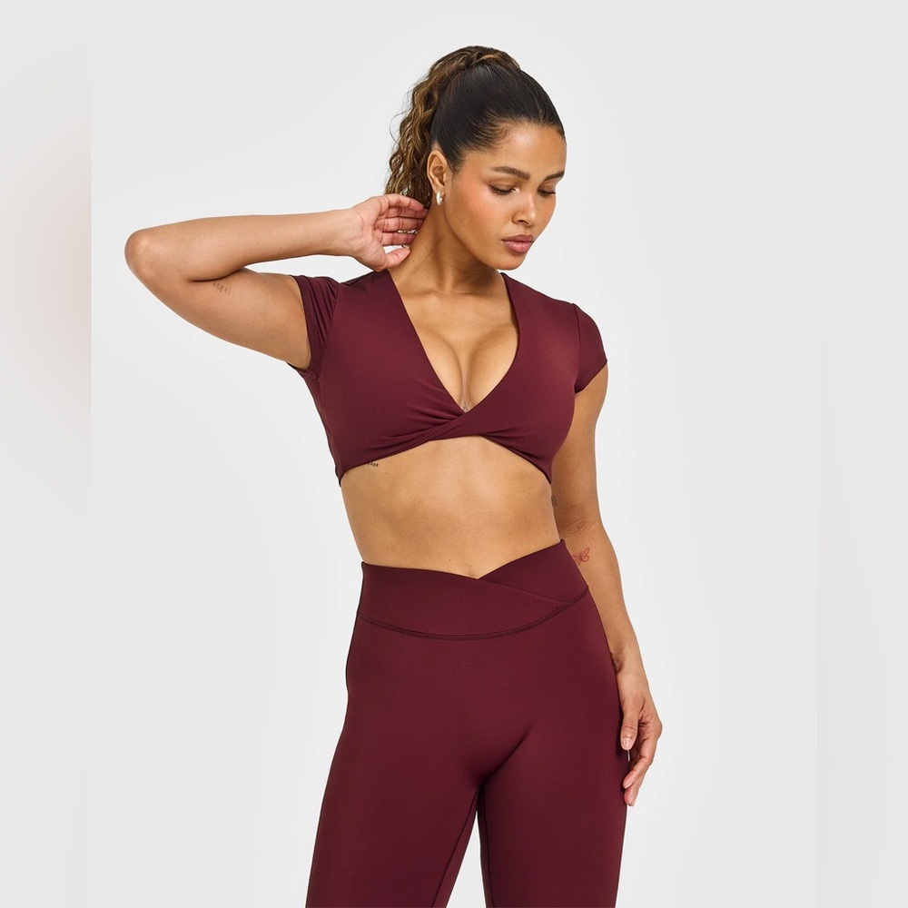 Oner Active UNIFIED TWIST FRONT SHORT SLEEVE CROP TOP WHITE LOGO